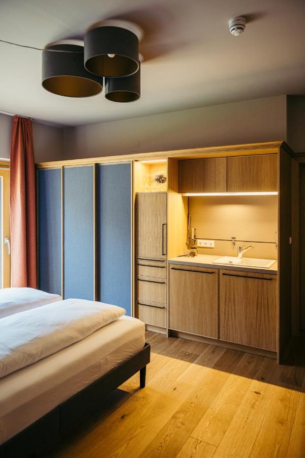 Appartementhotel Am Weissensee Bagian luar foto